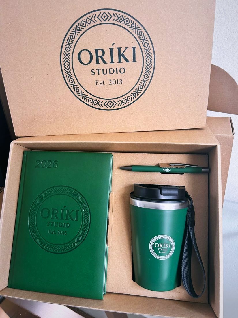 Oríki Studio executive gift box — debossed 2026 diary, branded pen and tumbler in printed kraft packaging